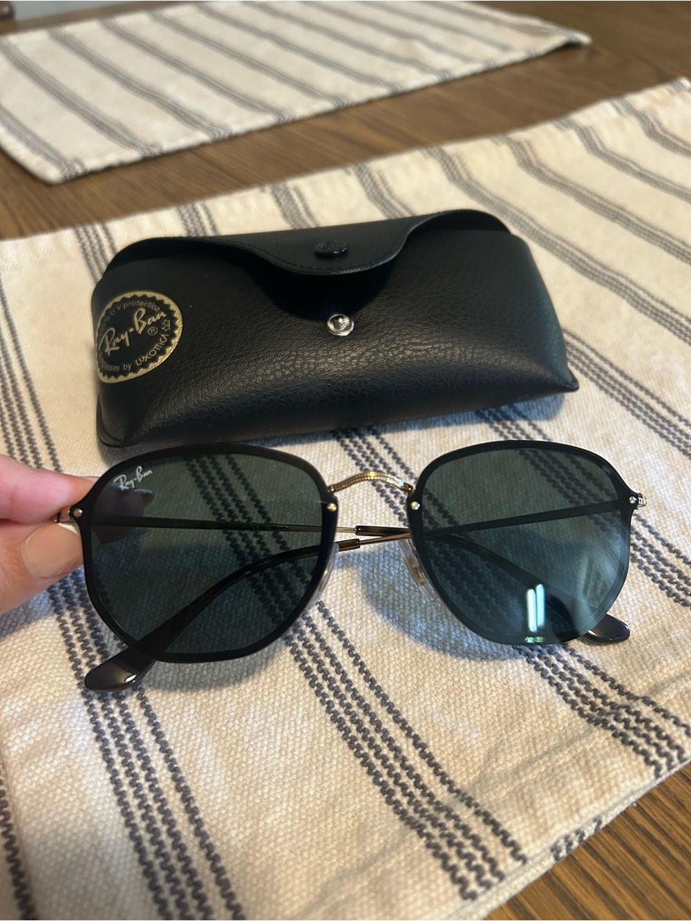 Ray-Ban Black Frame Sunglasses with Black Lenses and Gold details